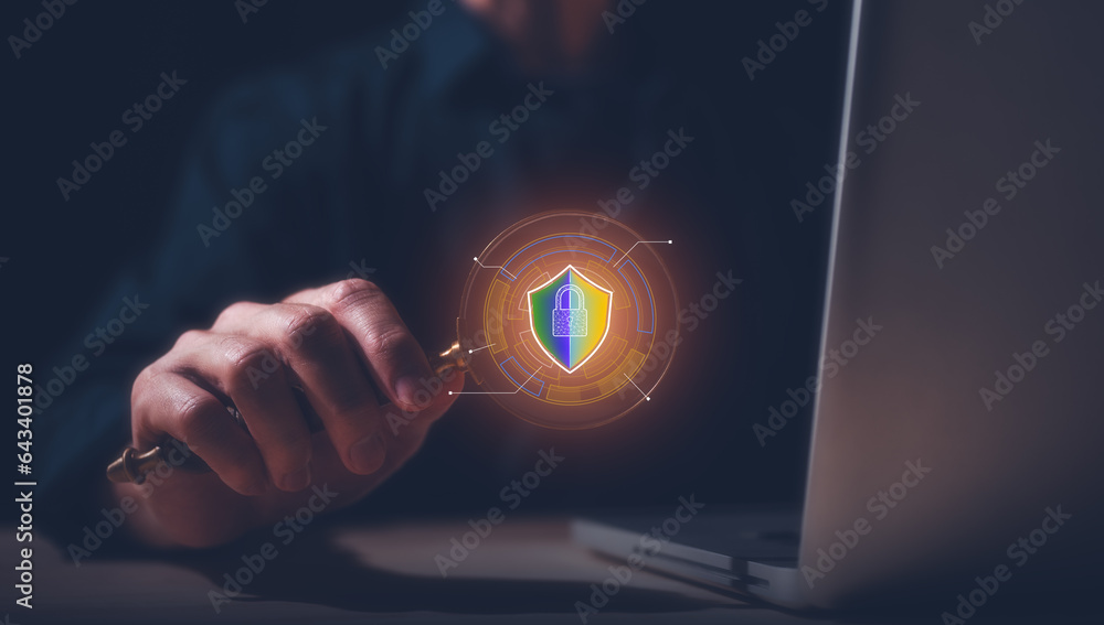 Poster hand holding magnifying glass with padlock in concept of cyber security internet privacy data protec