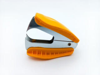 Orange Staple Remover Isolated On White Background. Side View