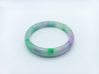 Obraz na płótnie Canvas Light green And Purple Color Combination Jade Bracelet Isolated On White Background