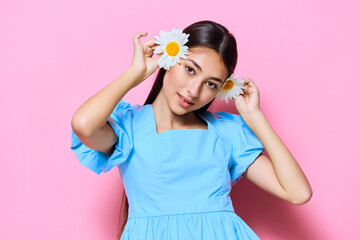 woman beautiful fashion flower studio camomile blue dress smile young pink