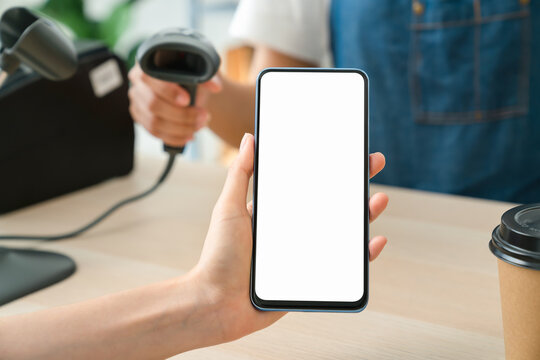 Hand holding smartphone with scan barcode for payment, shopping online, Digital wallet concept. Mockup of blank screen, take your screen to put on advertising.