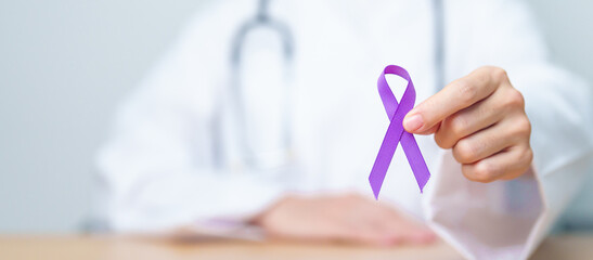 Doctor holding purple Ribbon for Violence, Pancreatic, Esophageal, Testicular cancer, Alzheimer,...