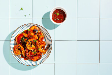 Grilled shrimp with hot sauce and herbs