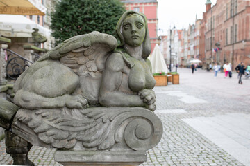 Ornaments, moldings, gargoyle, low reliefs in a sandstone, granite, concrete. sculpting details in Gdansk (Danzig).