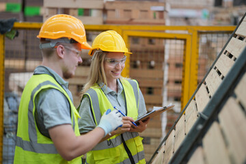 Industrial factory employee working in wooden manufacturing industry