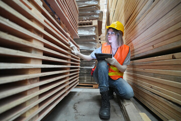 Industrial factory employee working in wooden manufacturing industry
