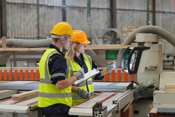 Industrial factory employee working in wooden manufacturing industry