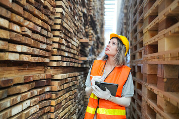 Industrial factory employee working in wooden manufacturing industry