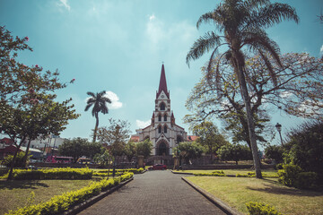 Beautiful church at the edge of a park in San Jose, the capital of Costa rica, called the Iglesia...