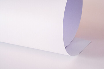 A large piece of paper in a warm color as a background.