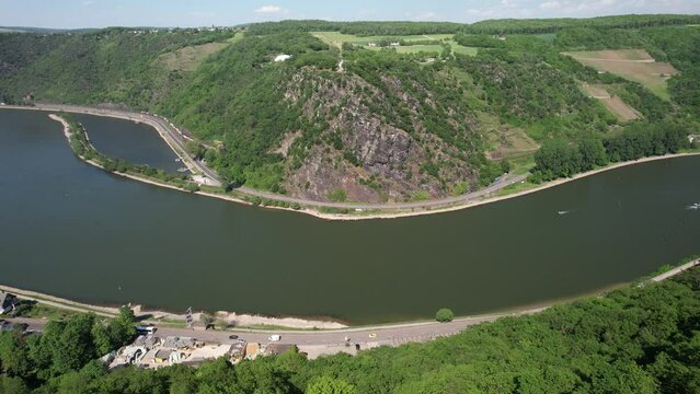 The striking slate rock Loreley near Sankt Goarshausen and the Rhine from the air, world heritage Upper Middle Rhine Valley, Rhineland-Palatinate, Germany | Aerial view of the steep slate rock