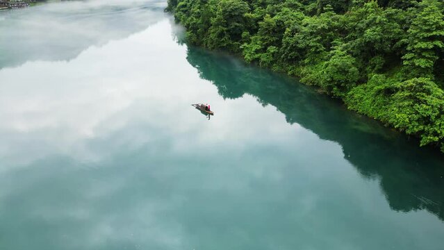 A little boat on the river
