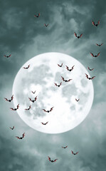 Bright moon and scary flying bats with red translucent wings
