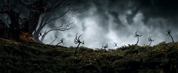 Zombie hands rising out of the ground in spooky forest - obrazy, fototapety, plakaty