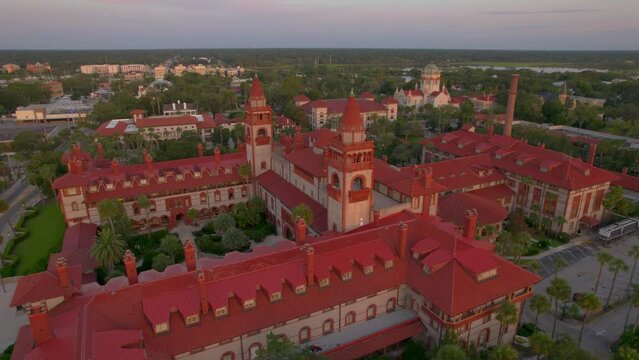St. Augustine's timeless charm. The city's rich history comes to life as the sun's first rays gently illuminate the Spanish colonial architecture such as Flagler College.