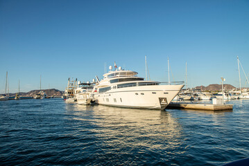 yachts in the marina of the bay in the so-called port of illusion, La Paz Baja California Sur. Mexico on a sunny summer afternoon.