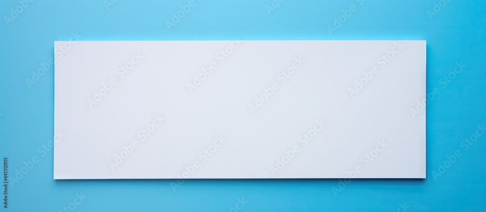 Poster gray paper sheet with space for design on a blue and pink background suitable for a greeting card
