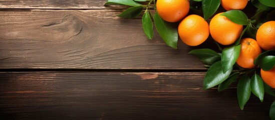 Mandarins on a wooden backdrop freshly harvested