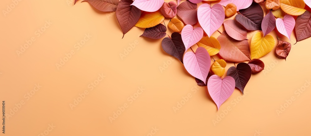 Aufkleber pink studio shoot with heart shaped cutout surrounded by autumn leaves in orange green yellow and br