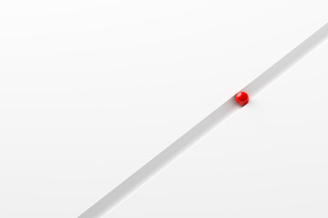 Red sphere moving on or following a path on white background with copy space.