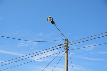 electric pole with blue sky background
