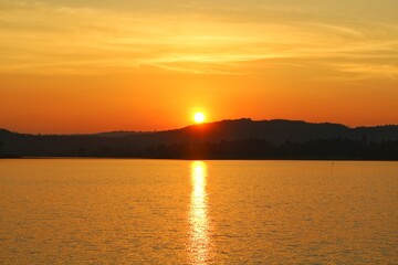 As the sun sets, its golden rays cast a warm and enchanting glow over the landscape. 