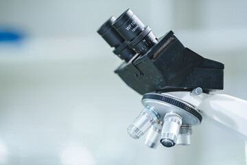 Closeup of Scientific microscope data analysis in the laboratory, medicine equipment setting in lab for chemistry or science research technology discovery, biotechnology or biology tool for study