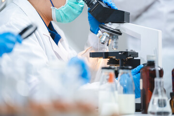 Closeup of Scientific microscope data analysis in the laboratory, medicine equipment setting in lab...