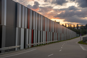 Modern warehouse and logistics centre at sunset