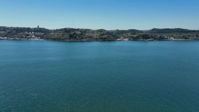 Crossing the river tejo with drone from Belem to Porto Brandao, Lisbon.