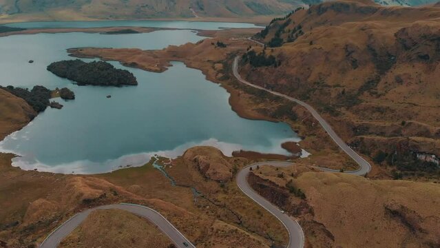 Aerial Drone Shot with Tilt Up Reveal of the Countryside Road to Lagunas de Atillo in Ecuador.