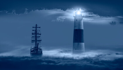 An old sailing ship in the mist sails towards the rocks with amazing lighthouse - Sailing old ship...