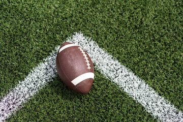 Football on Yardage Marker. Low Angle. Horizontal View