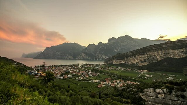 Timelapse at sunset of Lake Garda and mountains around