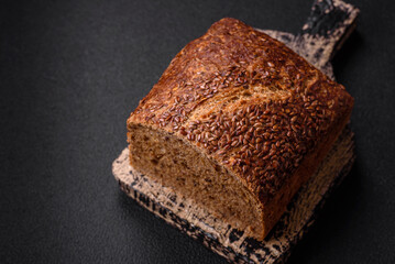 Delicious fresh crispy brown bread with grains and seeds