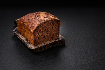 Delicious fresh crispy brown bread with grains and seeds