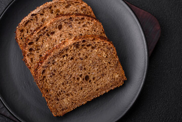 Delicious fresh crispy brown bread with grains and seeds