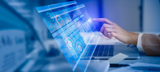 Business hand touching on laptop computer with big data technology and data interface science,...