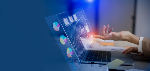 Business hand touching on laptop computer with big data technology and data interface science, Business analysing and artificial intelligence concept.