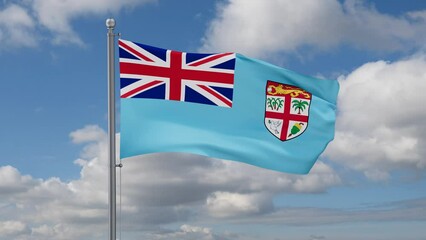 Republic of Fiji looped flag waving in the wind with blue sky and running clouds, cycle seamless loop video