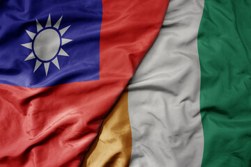 big waving national colorful flag of taiwan and national flag of cote divoire .