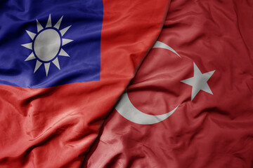 big waving national colorful flag of taiwan and national flag of turkey .