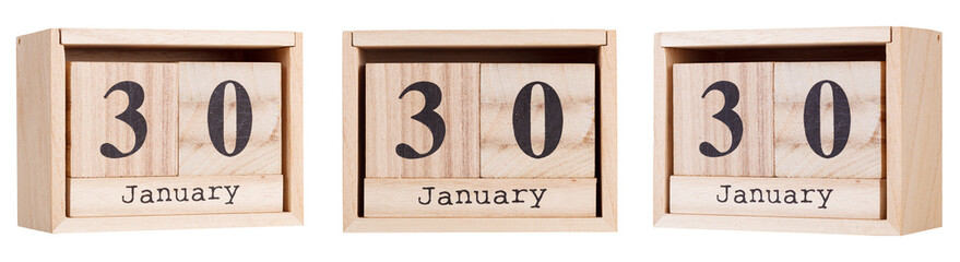 Wooden calendar, a set of dates of the month 30 January, on a white and transparent background close-up