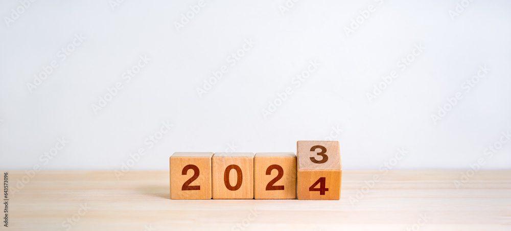 Poster 2024 happy new year with change to new era concepts. flipping the 2023 to 2024 year calendar numbers