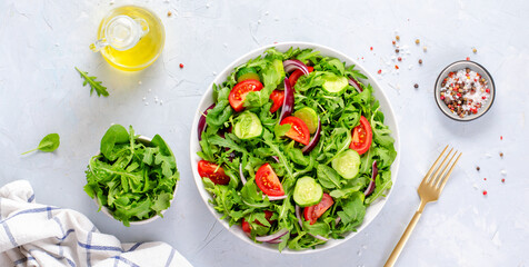 Healthy Vegetable Salad with Tomatoes, Arugula, Cucumbers and Onion, Diet Menu, Bright Background