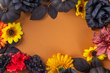 Dia de los muertos Feast flat lay, Mexican Day of the Dead holiday background with fall black, orange, yellow flowers, lightbox with text Dia de los muertos, colorful painted skull