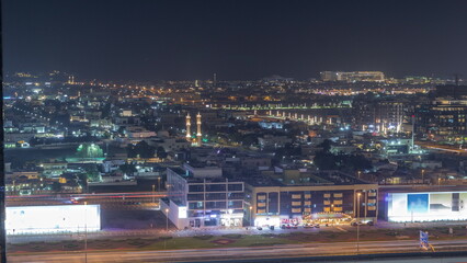 Obraz premium Aerial view to Dubai City Walk district night timelapse from above