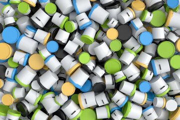 Pile of colorful plastic cans or buckets on white background.