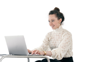Uses a laptop computer financier woman smiling in stylish clothes for work. Businesswoman creative manager is a person in the office.