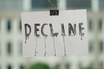 grungy decline sign, economic crisis,business and economic activities concept, blurred office...